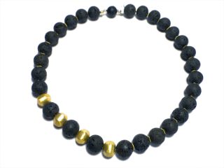 schwarze Lava Halskette mit goldfarbenen Buttons 2013